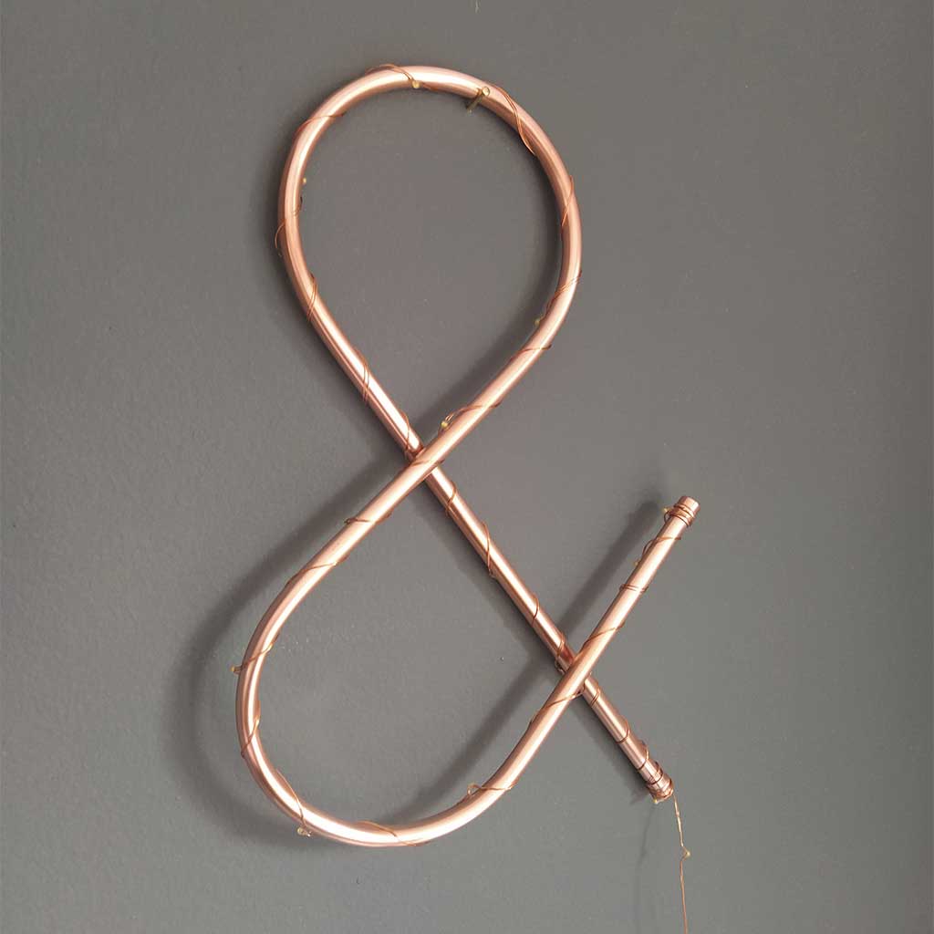 Copper Symbol handmade of recycled components by Emmet Bosonnet of Kopper Kreation in Dublin Ireland