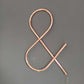 Copper Symbol handmade of recycled components by Emmet Bosonnet of Kopper Kreation in Dublin Ireland