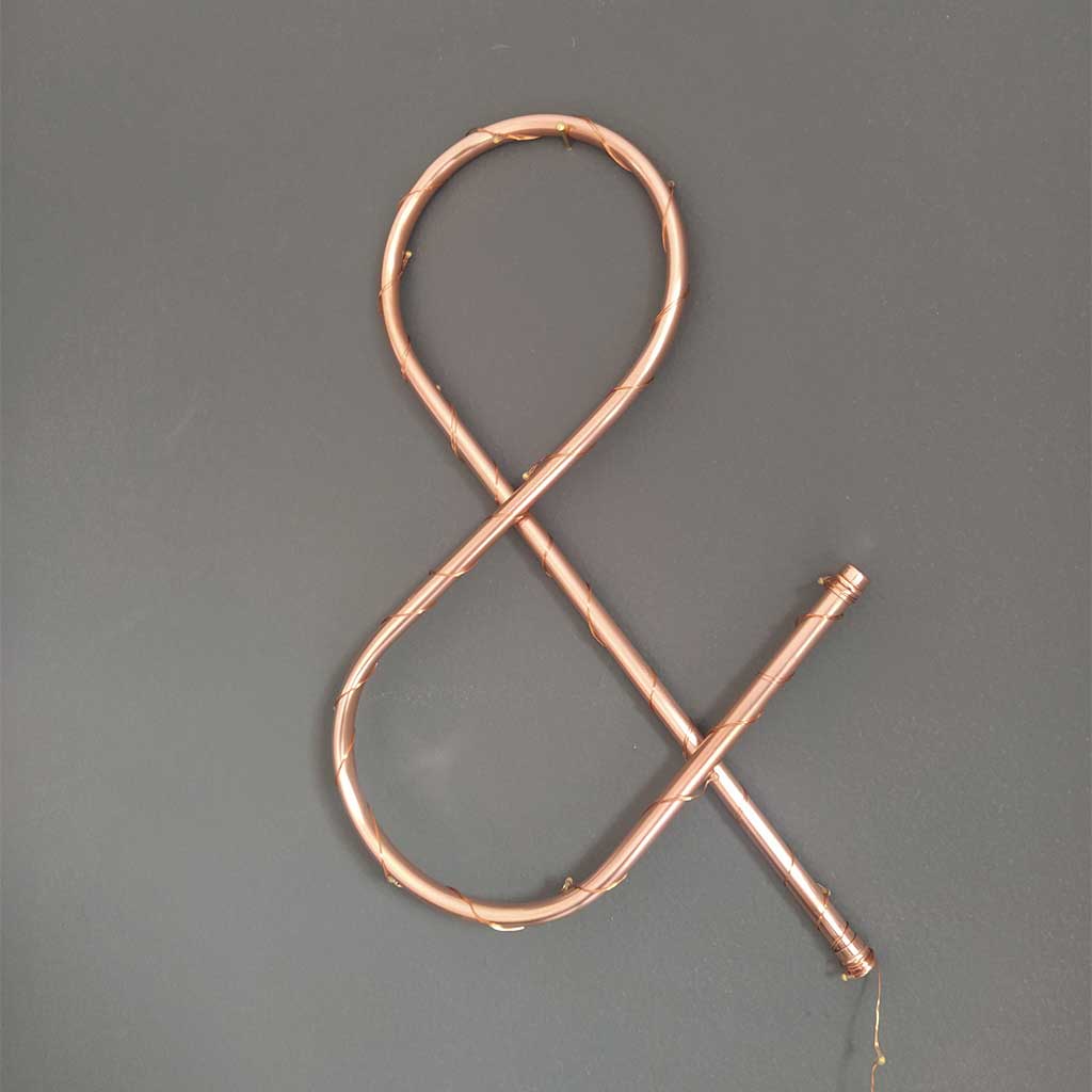 Copper Symbol handmade of recycled components by Emmet Bosonnet of Kopper Kreation in Dublin Ireland