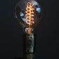 Flange-Lamp-with-spiral-incandescent-bulb-by-Emmet-Bosonnet-of-Kopper-Kreation-in-Dublin-Ireland