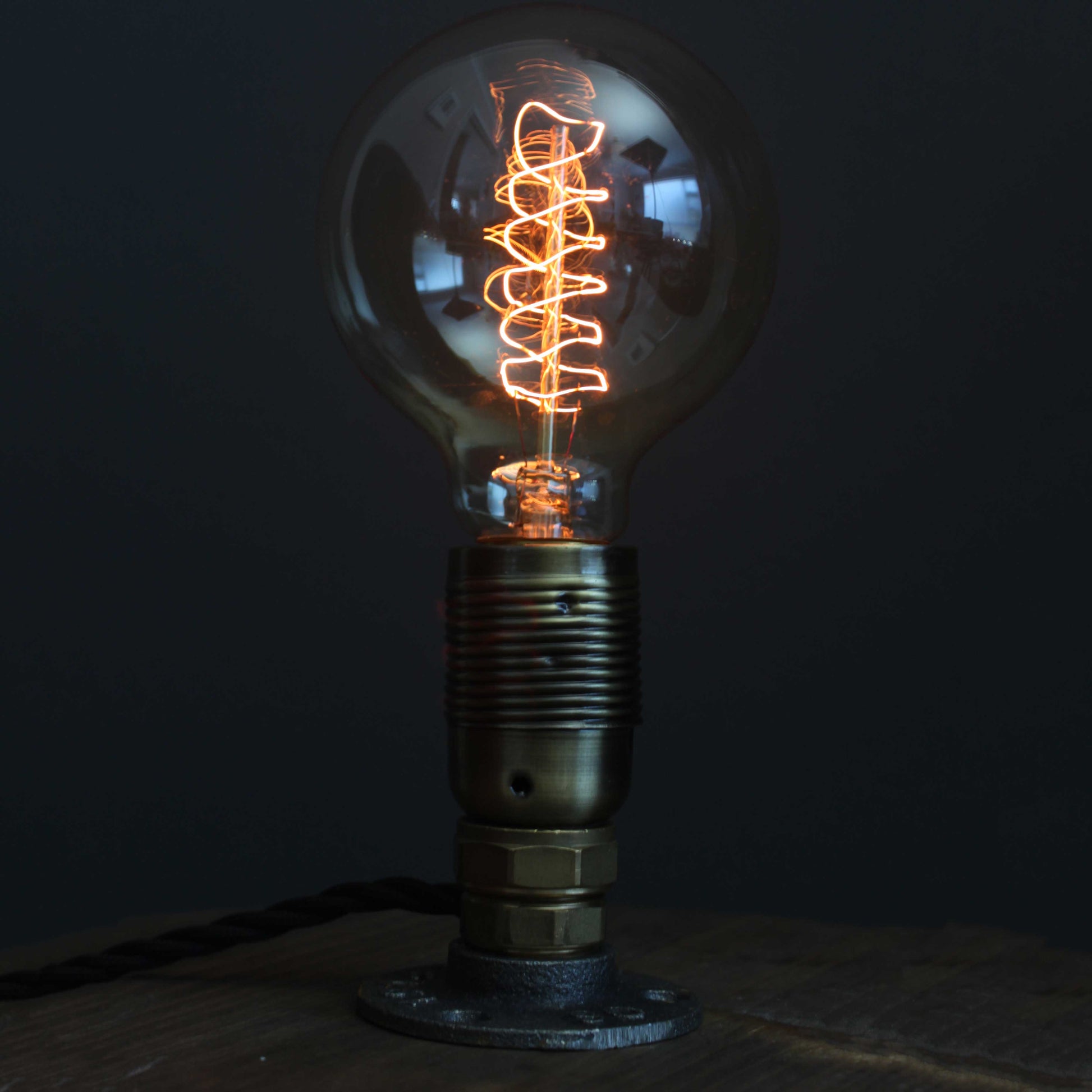 Flange-Lamp-with-spiral-incandescent-bulb-by-Emmet-Bosonnet-of-Kopper-Kreation-in-Dublin-Ireland